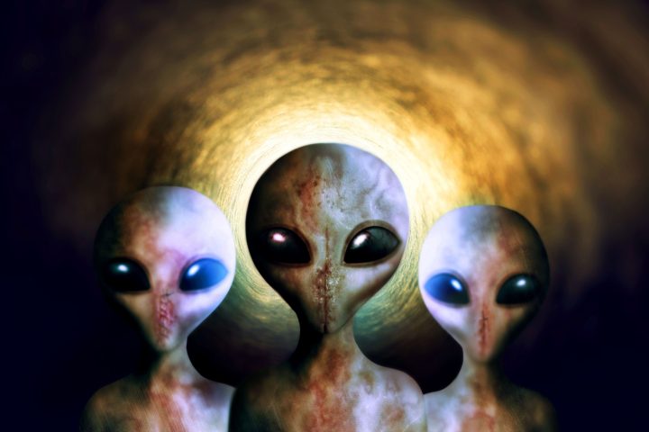 Alien, extraterrestrial or earth invasion from outer space, futuristic fantasy or scifi on a background. Portrait, creature or monster from a galaxy, universe or surreal cosmos at night in the dark